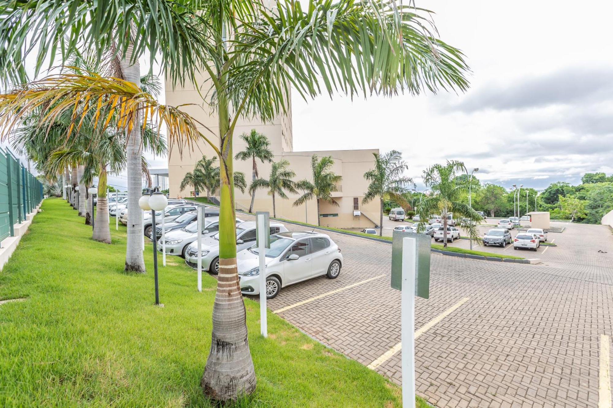 Hotel Inter Cuiaba Exterior photo Parking lot at the airport